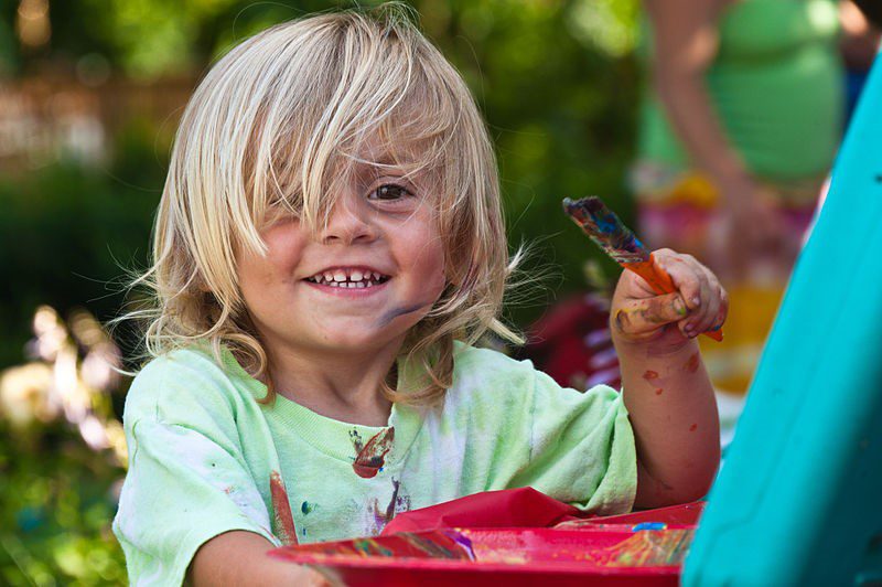 child with candy bar